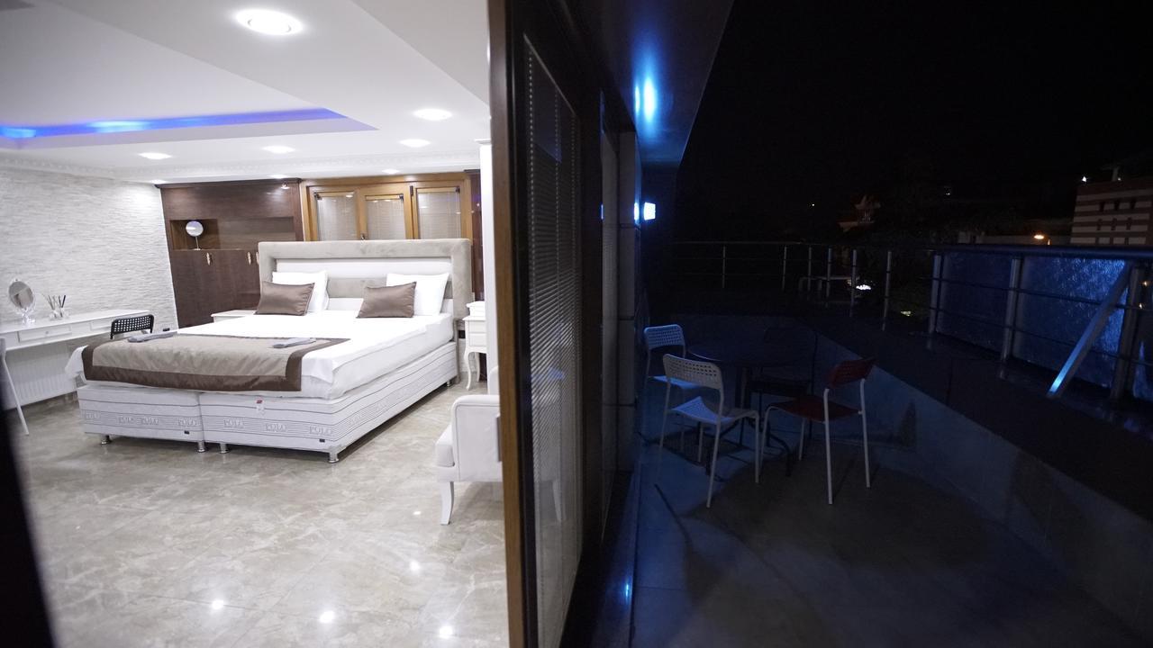 Suite mit Kingsize-Bett und Balkon